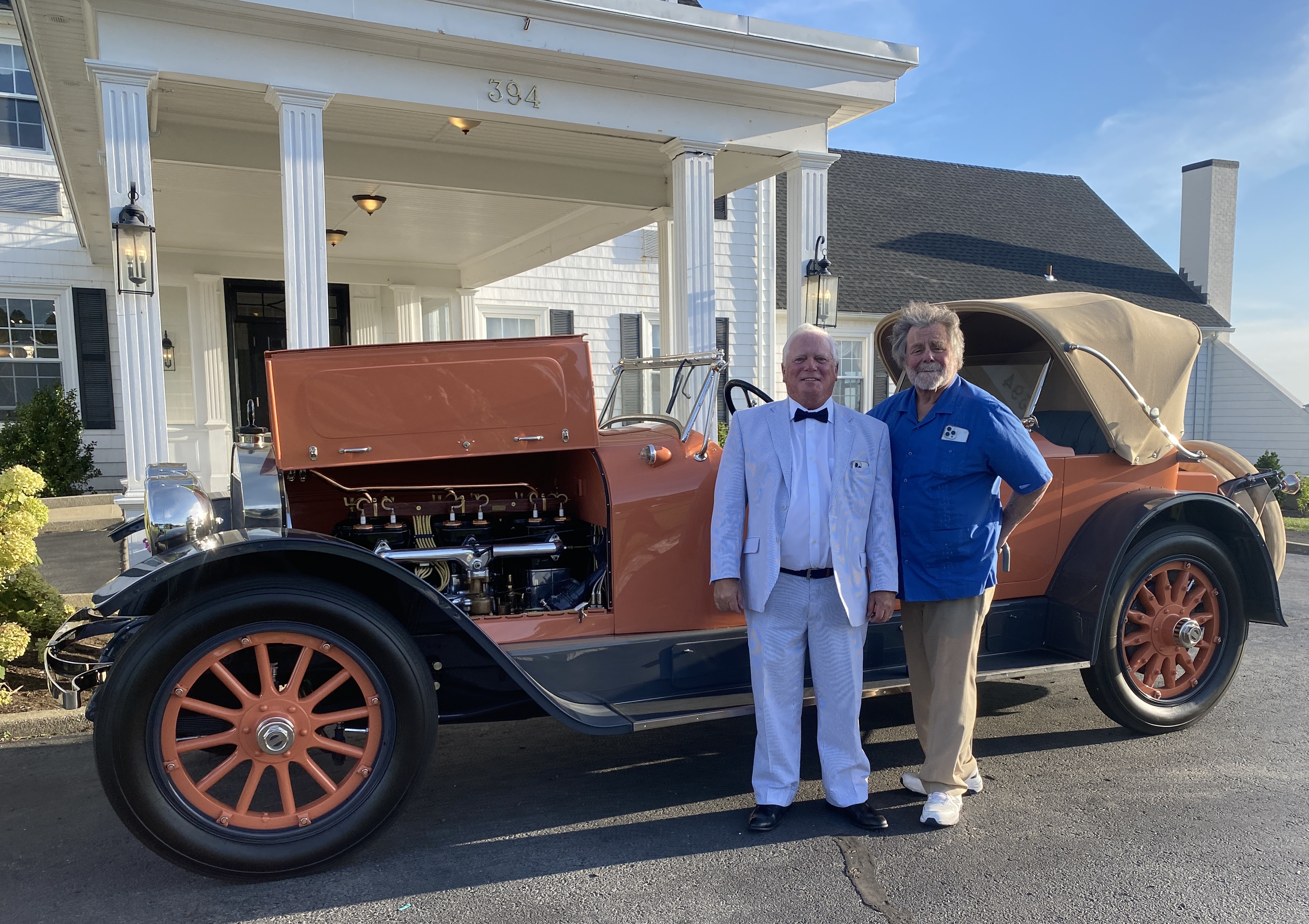 Club President Michael Harrington and Dick Shappy pose with Dick's 1917 Model 48 Locomobile.